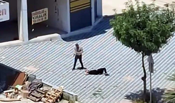 Polis məmuru oğlunu güllələdi - Video