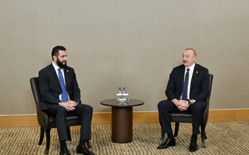 İlham Əliyev Suriyanın keçid dövrü Prezidenti ilə görüşüb - FOTOLAR