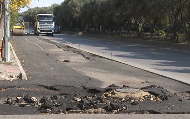 Bakıda yeni asfaltlanan yol çökdü- VİDEO